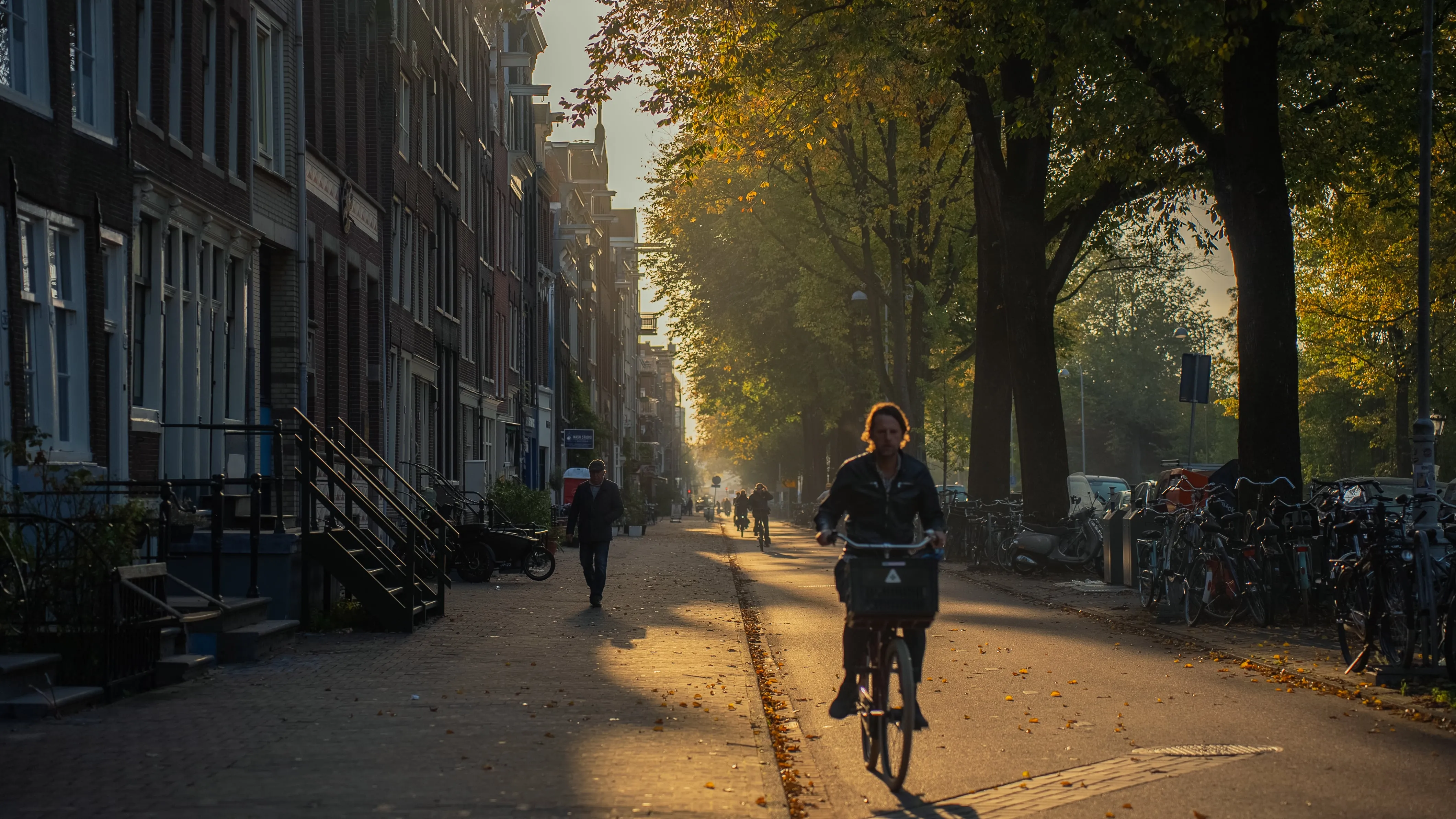 Sunrise sidewalk with bike passing by