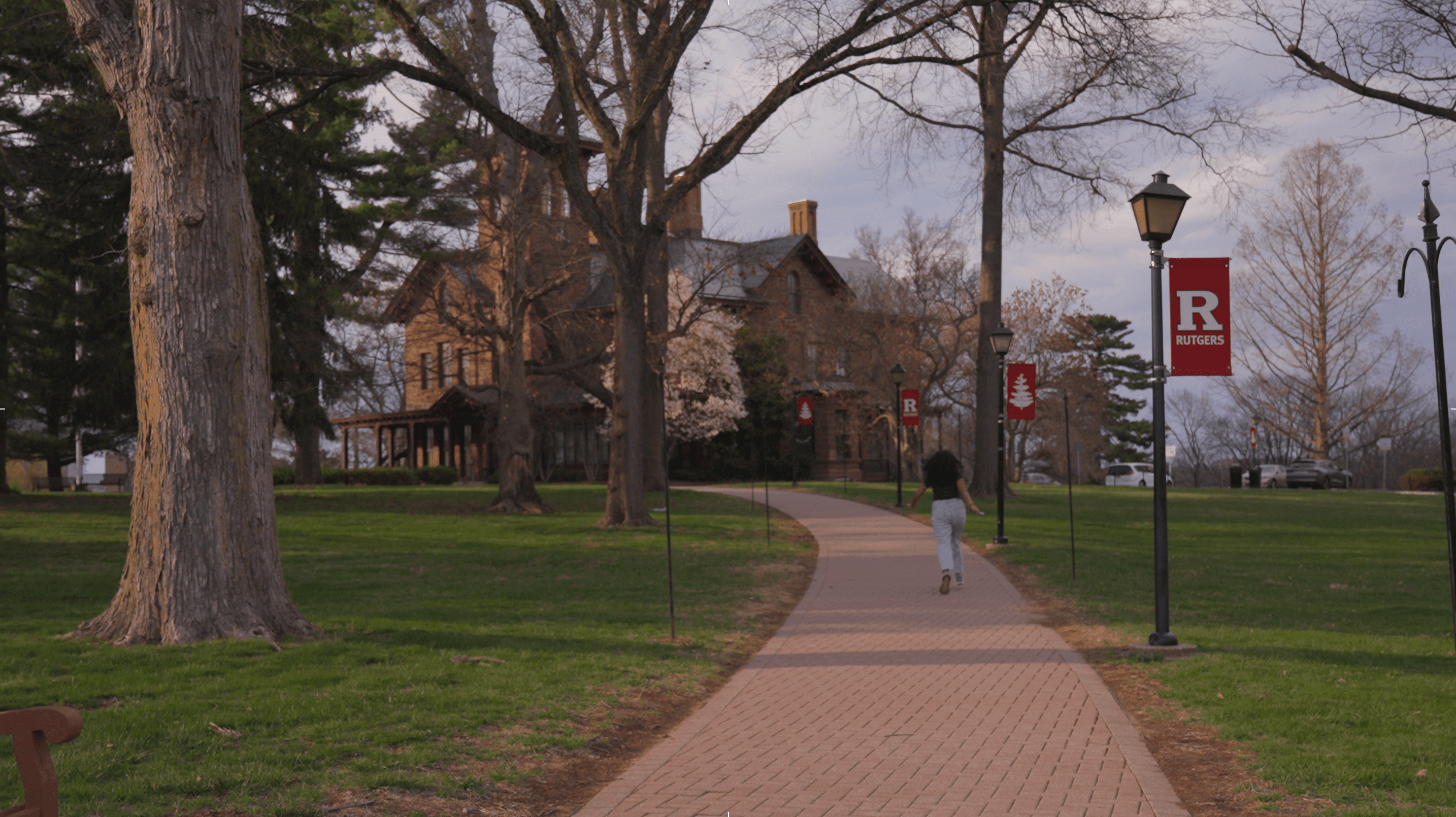 Main character running along the sidewalk