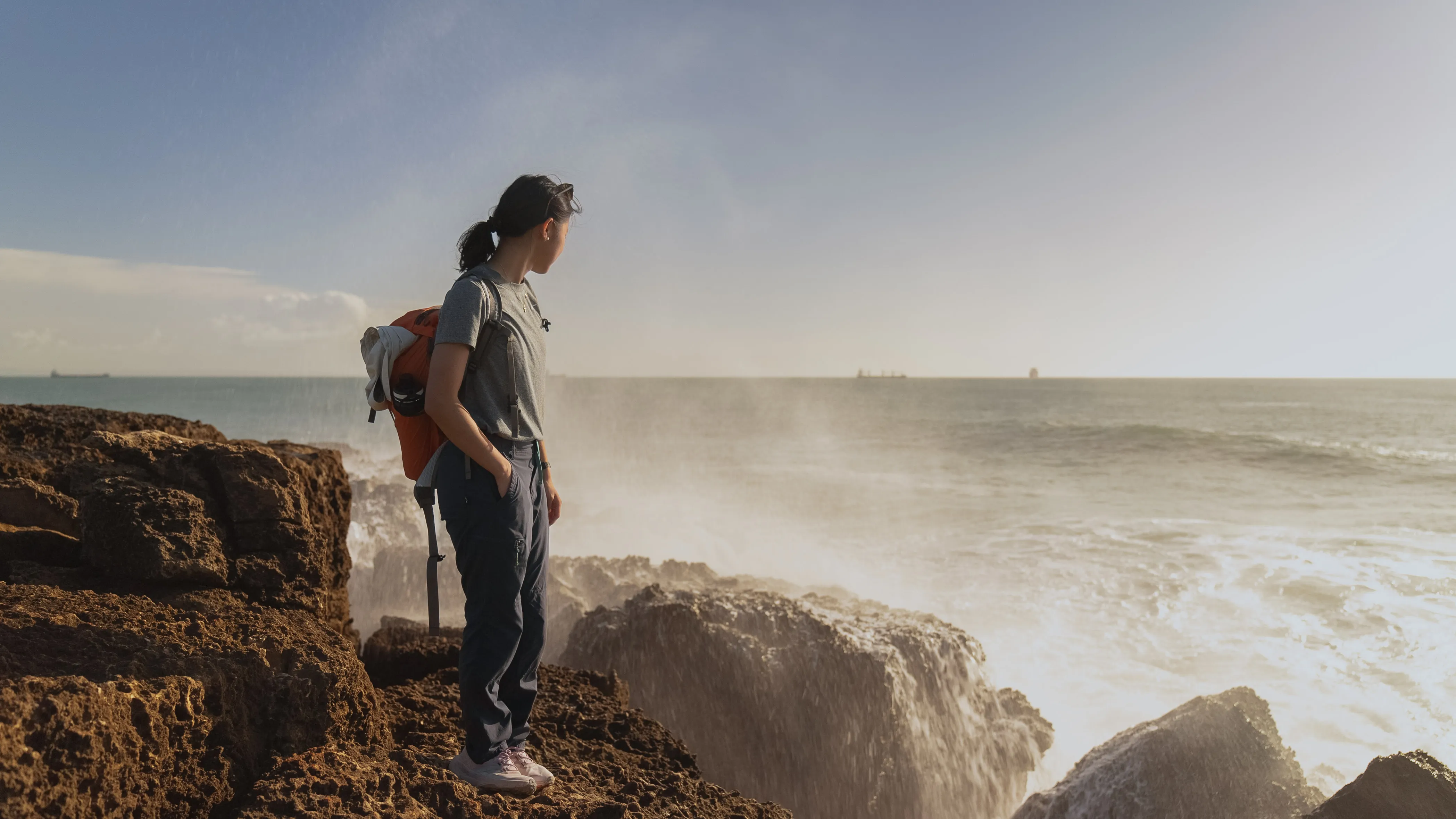 girl at rocky coast