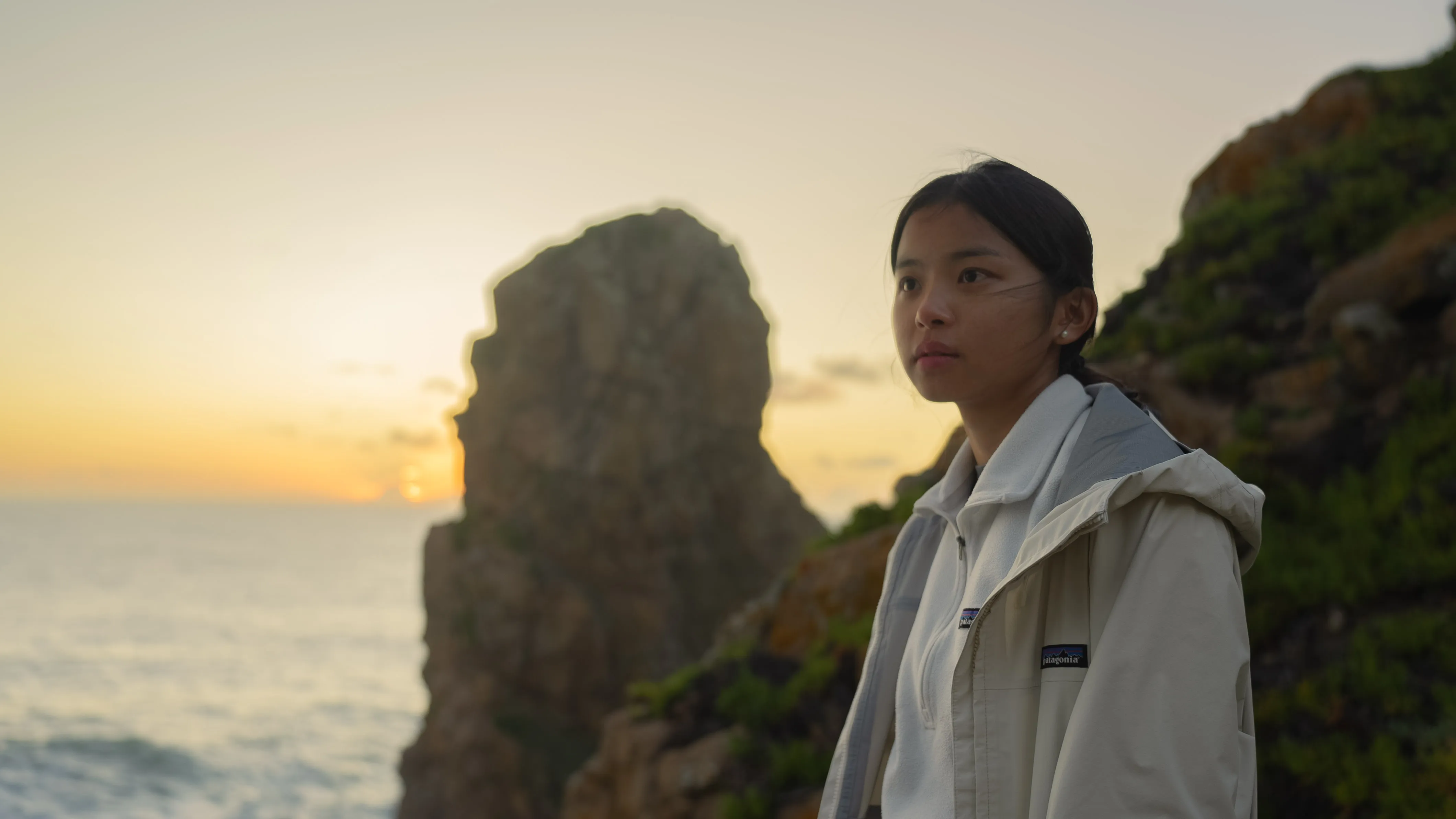 girl with sunset at coast