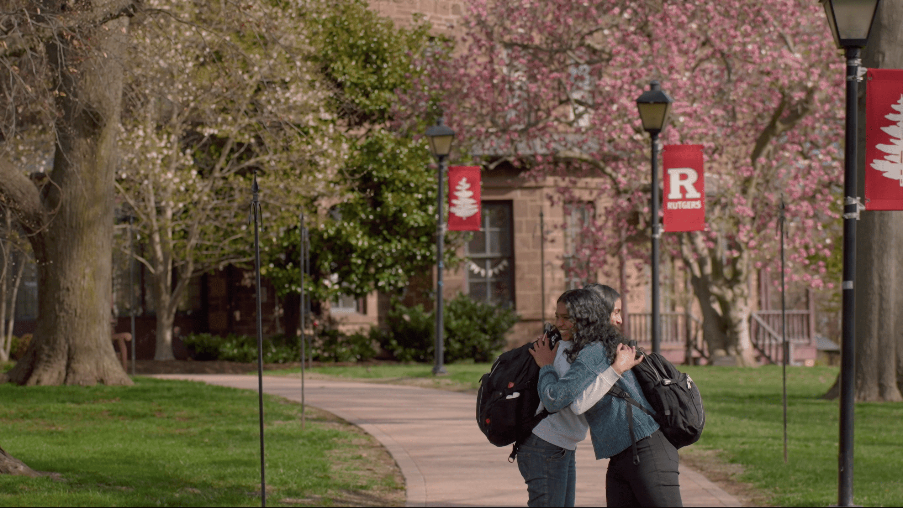 Main character hugging her friend